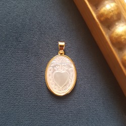 Médaille du Coeur Sacré.