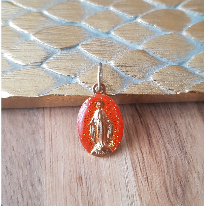 Médaille miraculeuse pailletée or , fond mandarine.