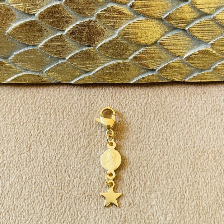 Médaille ancienne et mousqueton