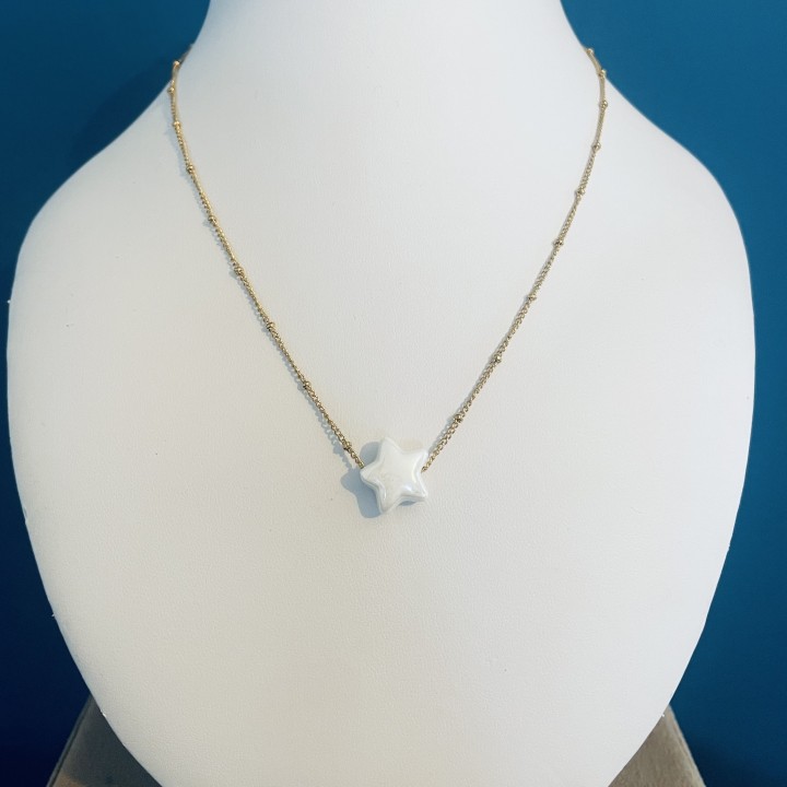 Collier étoile porcelaine.