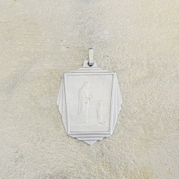 Magnifique médaille miraculeuse en argent finement travaillée.