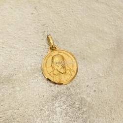 Très belle médaille du Christ en plaqué or.