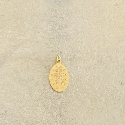 Médaille miraculeuse pailletée or , fond rose poudré.