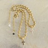 Bracelet chaine boule et croix strass plaqué or.