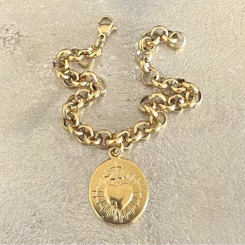 Un bijoux religieux : le bracelet médaille ex voto acier doré inoxydable. Un bijoux religieux : le bracelet médaille ex voto acier doré inoxydable.
