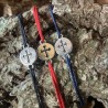 Bracelet coulissant médaille croix trilobée.