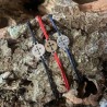 Bracelet coulissant médaille croix trilobée.