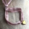 Bracelet tartan et cœur doré.
