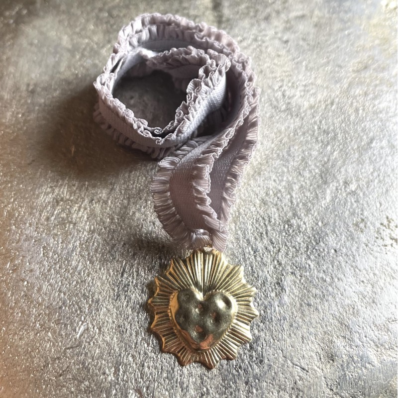 Un bijoux religieux : le bracelet médaille ex voto  acier doré inoxydable.