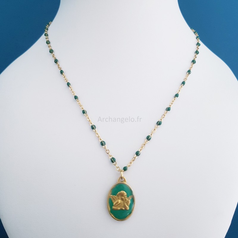 Pendentif Ange émeraude et or pailleté.