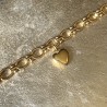 Bracelet Héraclès et son cœur doré.