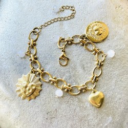 Un bijoux religieux : le bracelet médaille ex voto  acier doré inoxydable.